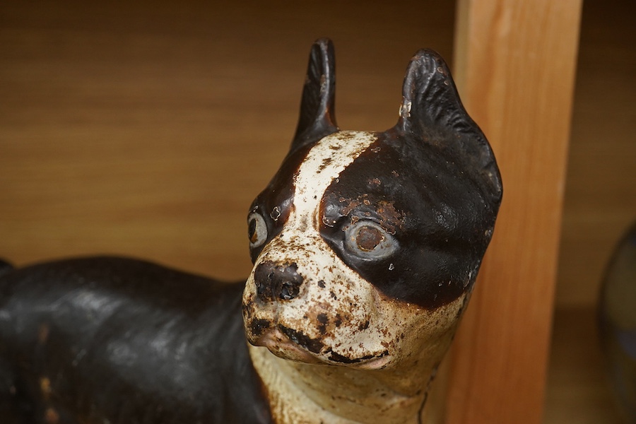 A painted cast iron model of a Boston Terrier, 25cm tall. Condition - fair to good